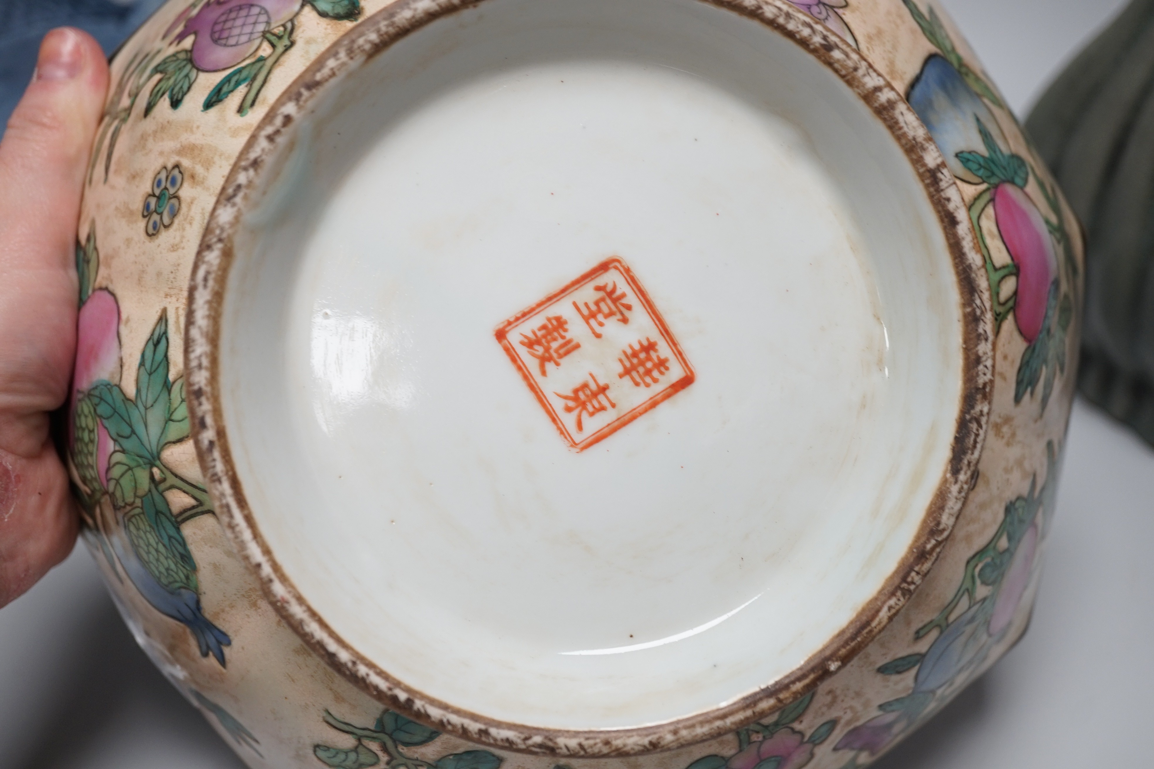 A Chinese blue and white ‘qilin’ dish, an octagonal bowl and a Korean celadon vase (3) largest 33cm diameter